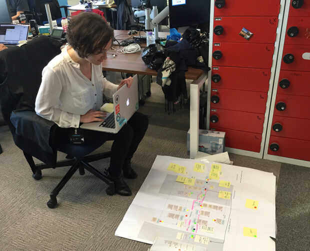 Very often it helps us to create user journey maps and process flows to understand the scope of the service. Here one of our designers, Asli Ozpehlivan, is tweaking a user journey map based on feedback.