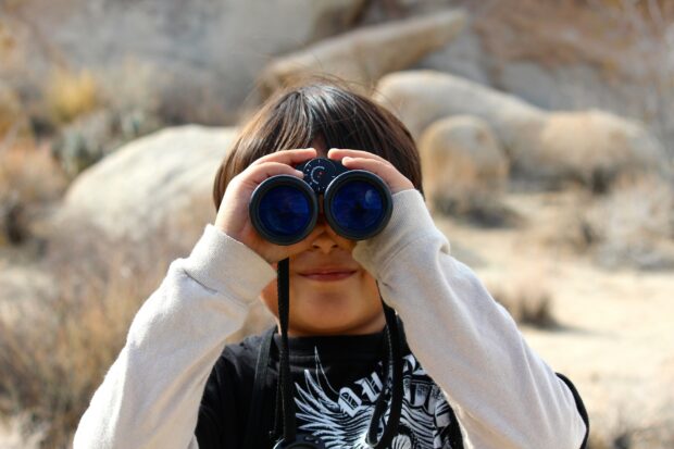 Child with binoculars