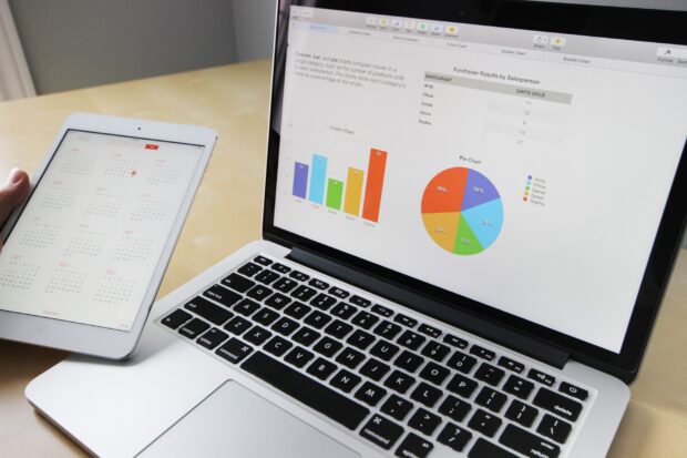 Laptop displaying graphs